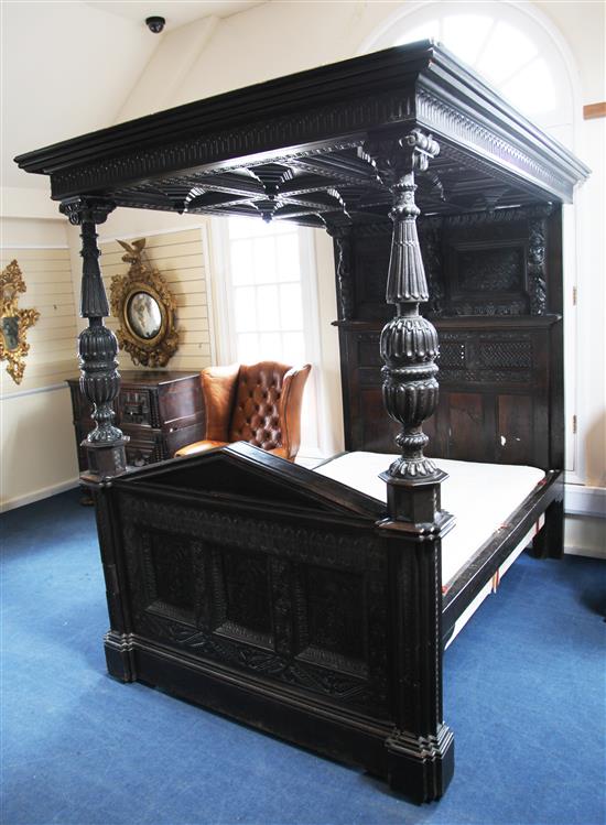 A 17th century style carved oak tester bed, overall W.5ft 3in. H.7ft 4.5in. L.7ft 4.5in.